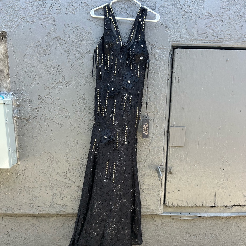 Bebe Black Long Sleeve Gown with Spaghetti Straps for Prom